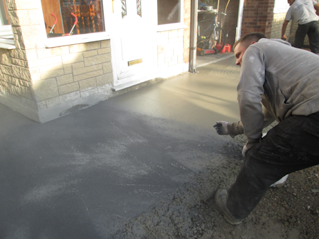 Concrete surface being levelled