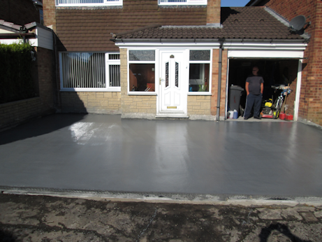 Colour hardener being worked into the surface