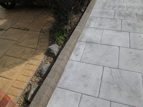 Concrete surface being prepared for sealant