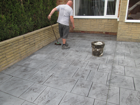 Freshly sealed concrete driveway